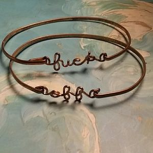Set of "Fuck Off" bracelets.